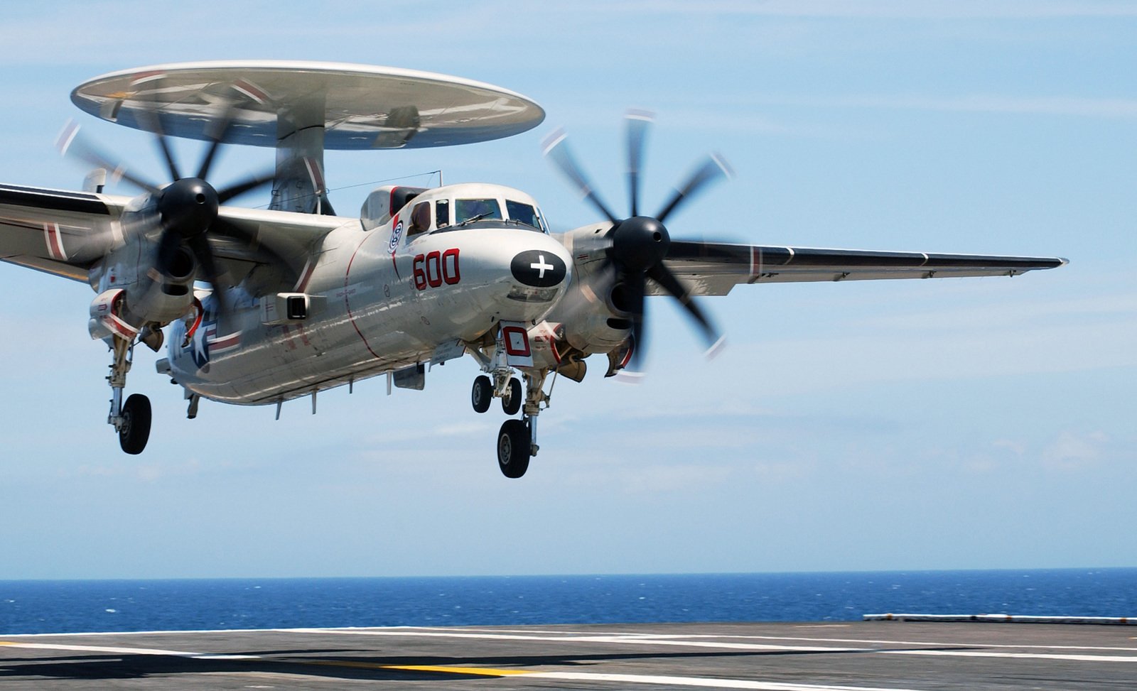 A US Navy (USN E2C Hawkeye airborne early warning aircraft, with the