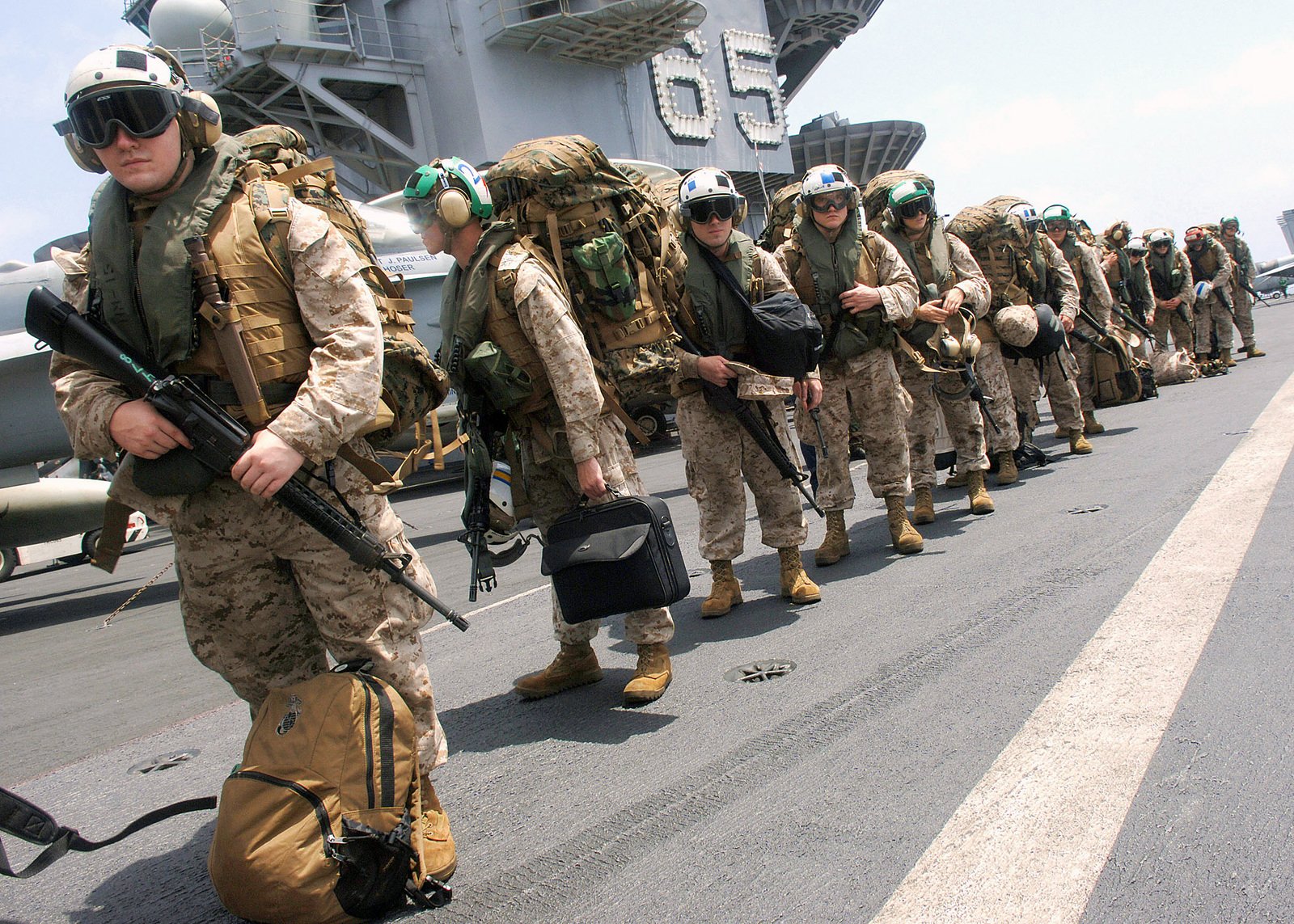 U.S. Marine Corps Marines aboard the U.S. Navy Aircraft Carrier USS ENTERPRISE (CVN 65) and assigned