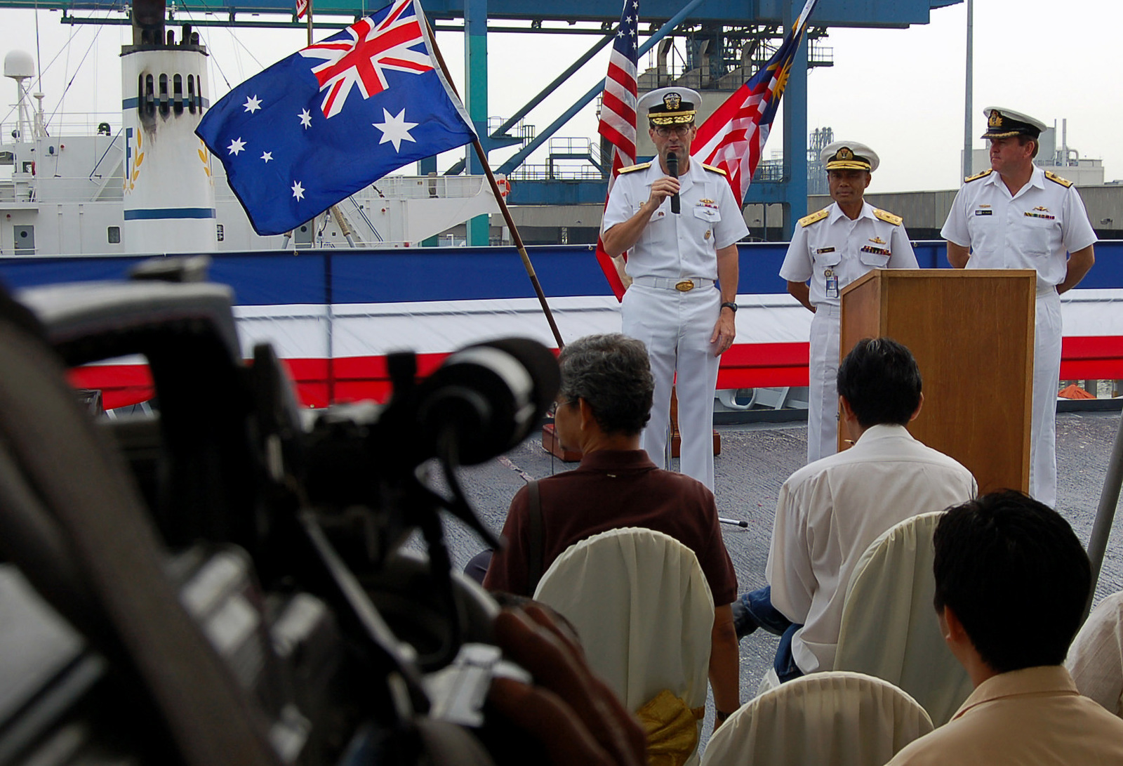 US Navy Rear Adm. John Bird (left), Commander, Submarine Group 7 ...