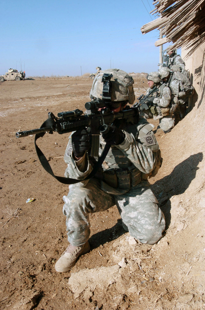 U.S. Army soldiers armed with Colt 5.56mm M4 carbine Rifles, from the ...