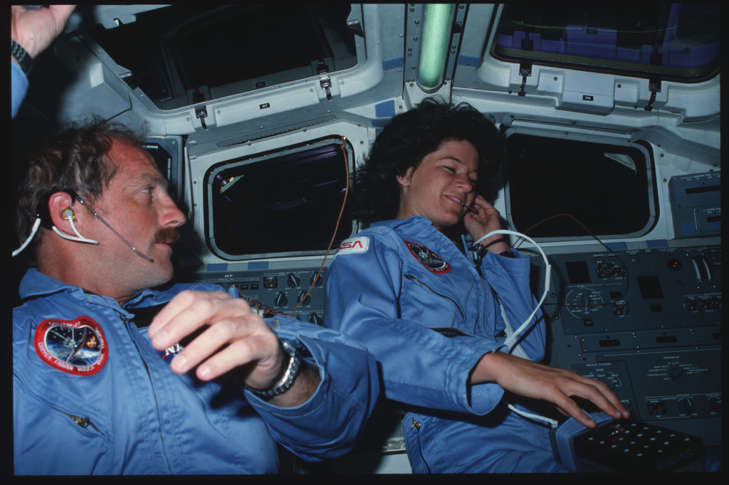 S07-02-012 - STS-007 - Pilot Hauck and Mission Specialist (MS) Ride on ...