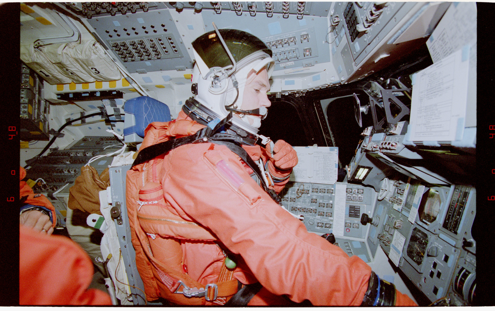 STS079-366-019 - STS-079 - STS-79 crewmembers in orange launch and ...