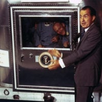 18 April 1970) --- President Richard M. Nixon and astronaut James A. Lovell  Jr., Apollo 13 commander, shake hands at special ceremonies at Hickam Air  Force Base, Hawaii. - SuperStock