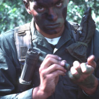 A Marine wearing camouflage face paint participates in Exercise SOLID  SHIELD '83 - NARA & DVIDS Public Domain Archive Public Domain Search