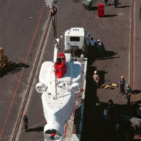 The US Navy (USN) 21-ton Deep Submergence Vehicle Turtle (DSV 3), Submarine  Development Squadron 5 (COMSUBDEVRON FIVE), is lowered into position aboard  her transportation trailer at Naval Air Station North Island (NASNI),  California, after its