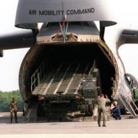 The new 60K Tunner Loader is marshaled off of a C-5 Galaxy marking the ...