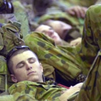 Australian Soldiers From The 2nd Royal Australian Regiment Rar Townsville Australia Rest In The Hangar Deck Of The Uss Essex Lhd 2 After Coming Aboard From The Uss Juneau Lpd 10 During