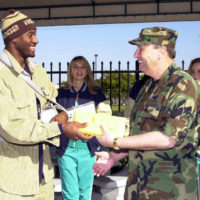 Miami Dolphins Linebacker Derek Rogers autographs souvenir footballs for  the troops at the US Southern Command in Miami - NARA & DVIDS Public Domain  Archive Public Domain Search