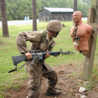 An Unidentified Us Marine Corps Usmc Recruit Assigned To Charlie Company 1st Battalion Platoon 1084 Execute A Straight Thrust On The Practice Dummy During His Movement Through The Bayonet Assault Course Aboard Marine - bct fort jackson south carolina roblox