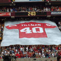 Richard Tillman, the brother of Cpl. Pat Tillman, raises a toast