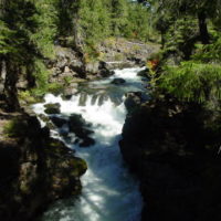 Rogue-Umpqua Scenic Byway - Tree-Lined Waterway At The Rogue-Umpqua ...